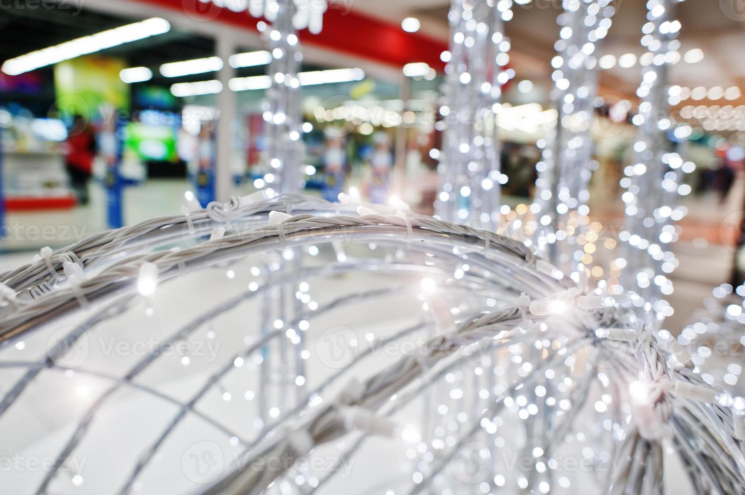 New Year scenery from white garlands decorations at shopping mall. photo