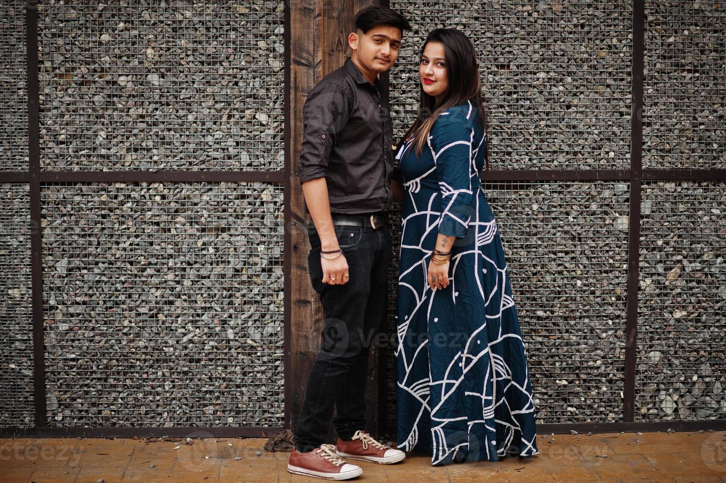 Love story of indian couple posed outdoor. photo