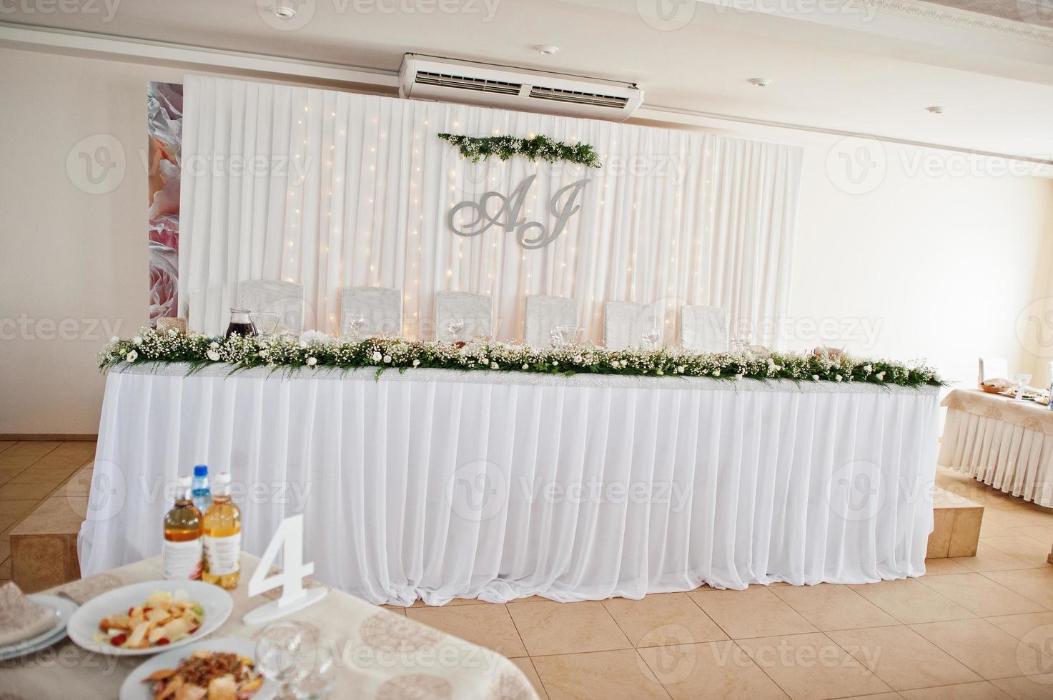 Wedding table set up in restaurant. photo