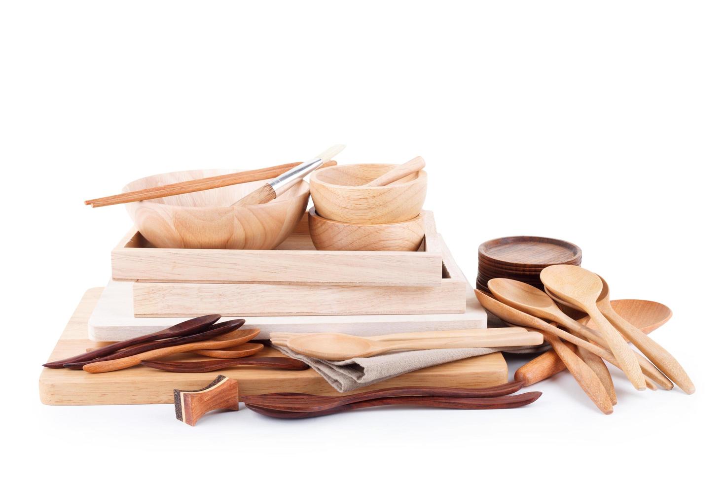 Various wooden kitchen utensils on table top view photo