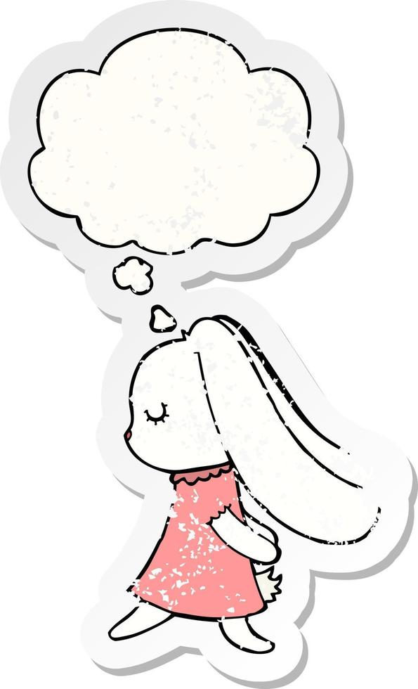 cute cartoon rabbit and thought bubble as a distressed worn sticker vector