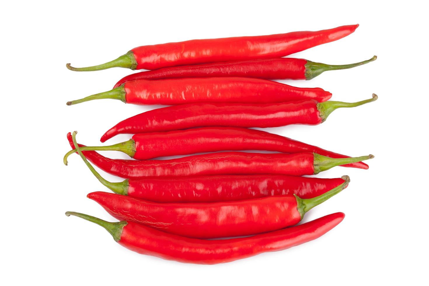 red chili or chilli cayenne pepper isolated on white background photo