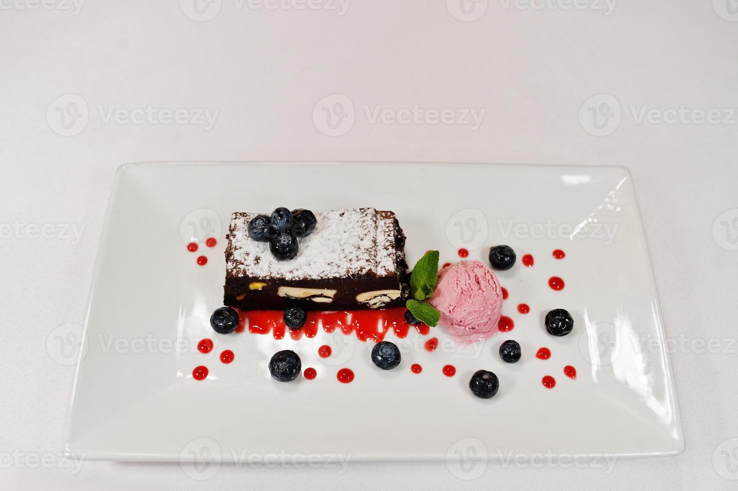 View on white background of cake with ice cream. Healthy food, diet lunch concept. photo