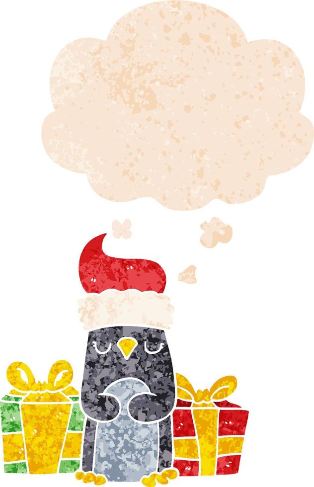 cute christmas penguin and thought bubble in retro textured style vector