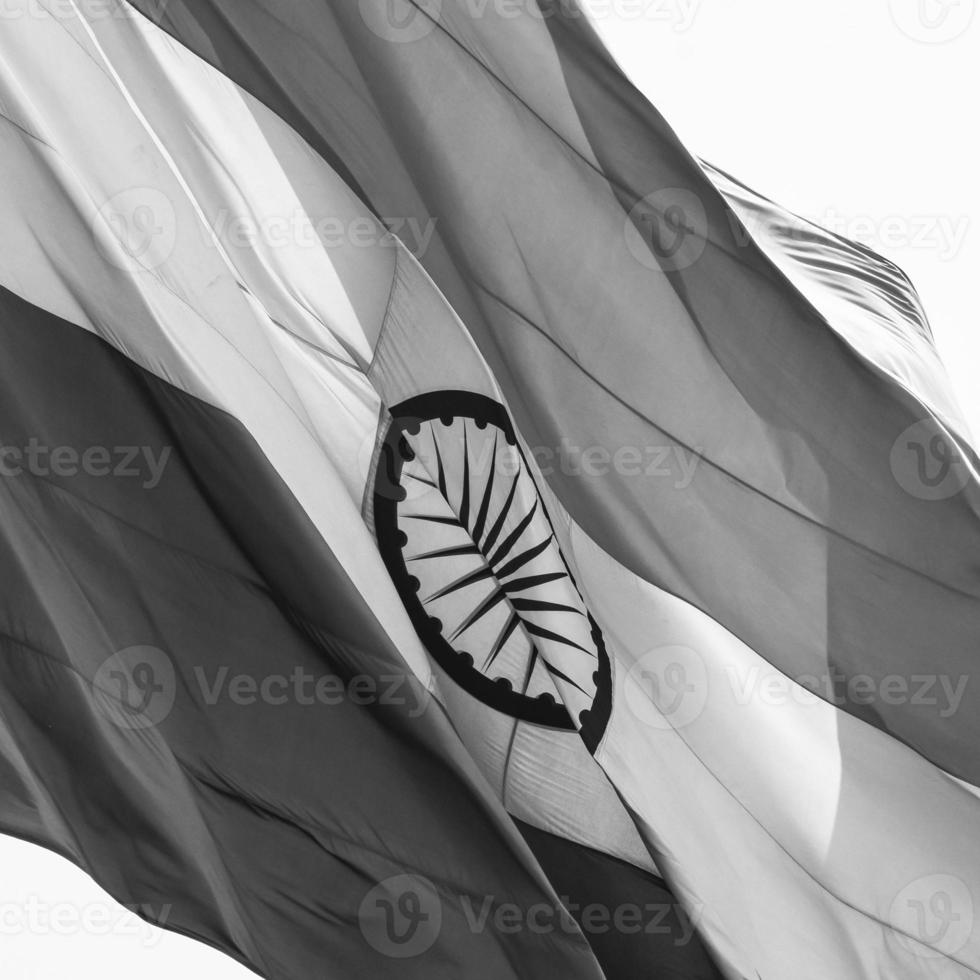 India flag flying at Connaught Place with pride in blue sky, India flag fluttering, Indian Flag on Independence Day and Republic Day of India, waving Indian flag, Flying India flags - Black and White photo