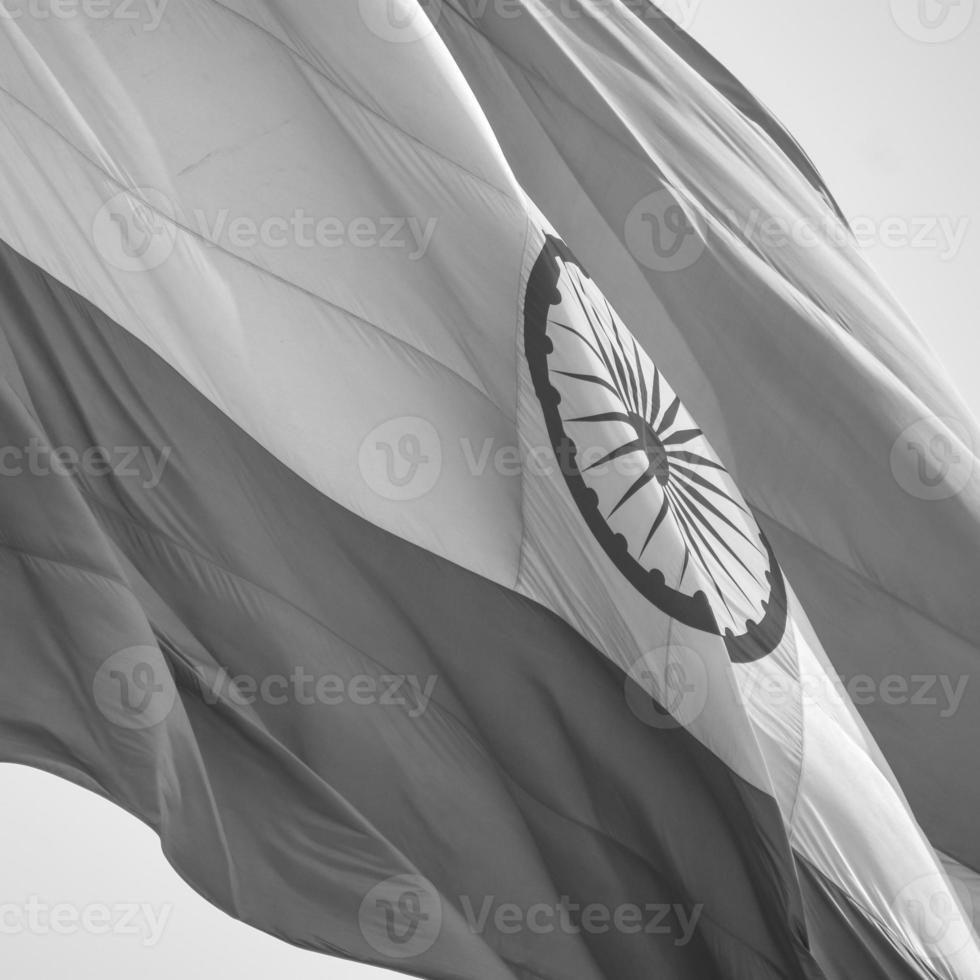 India flag flying at Connaught Place with pride in blue sky, India flag fluttering, Indian Flag on Independence Day and Republic Day of India, waving Indian flag, Flying India flags - Black and White photo