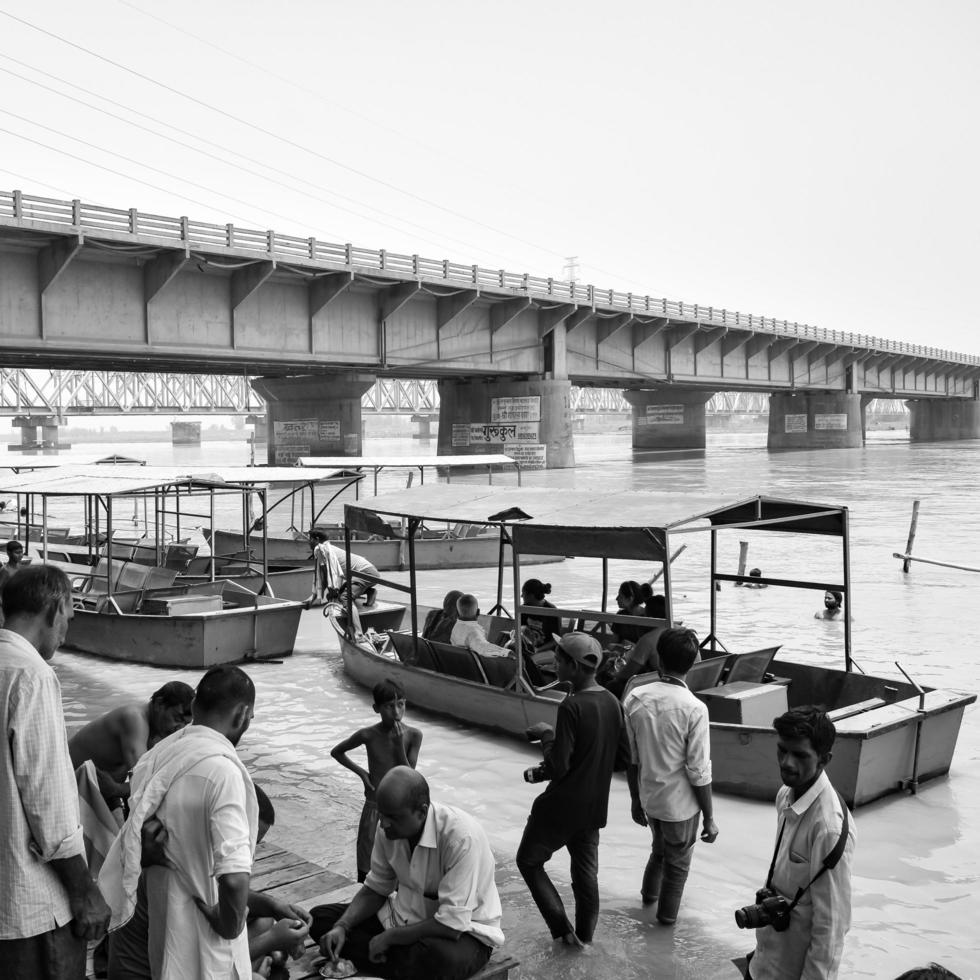 Garh Mukteshwar, UP, India, June 11 2022 -People are taking holy dip on the occasion of Nirjala Ekadashi, A view of Garh Ganga Brij ghat which is very famous religious place for Hindus-Black and White photo