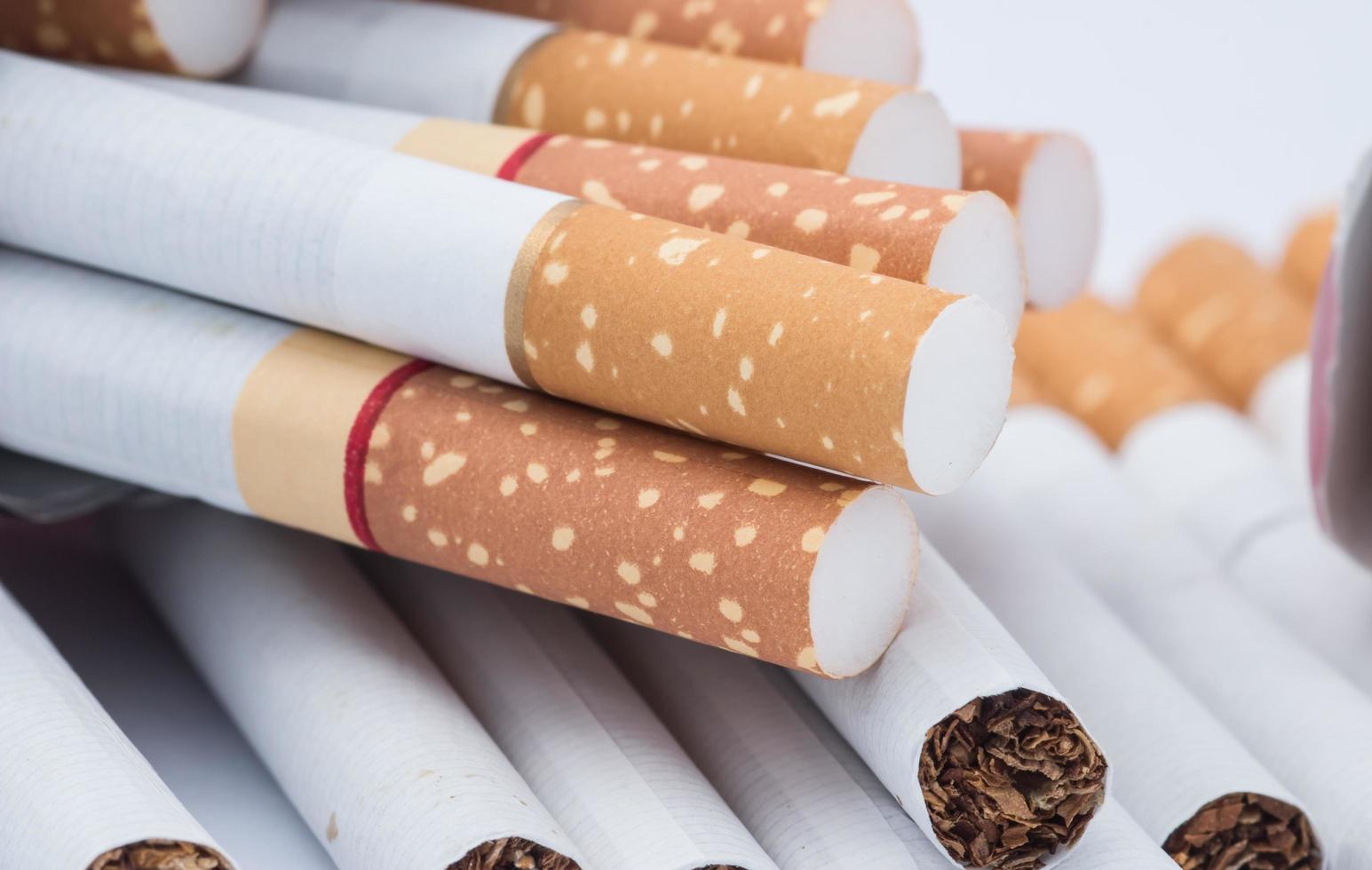 Closeup of a pile of cigarettes photo