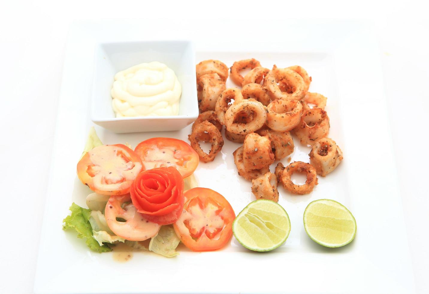 fried calamari, fried squid with lemon photo