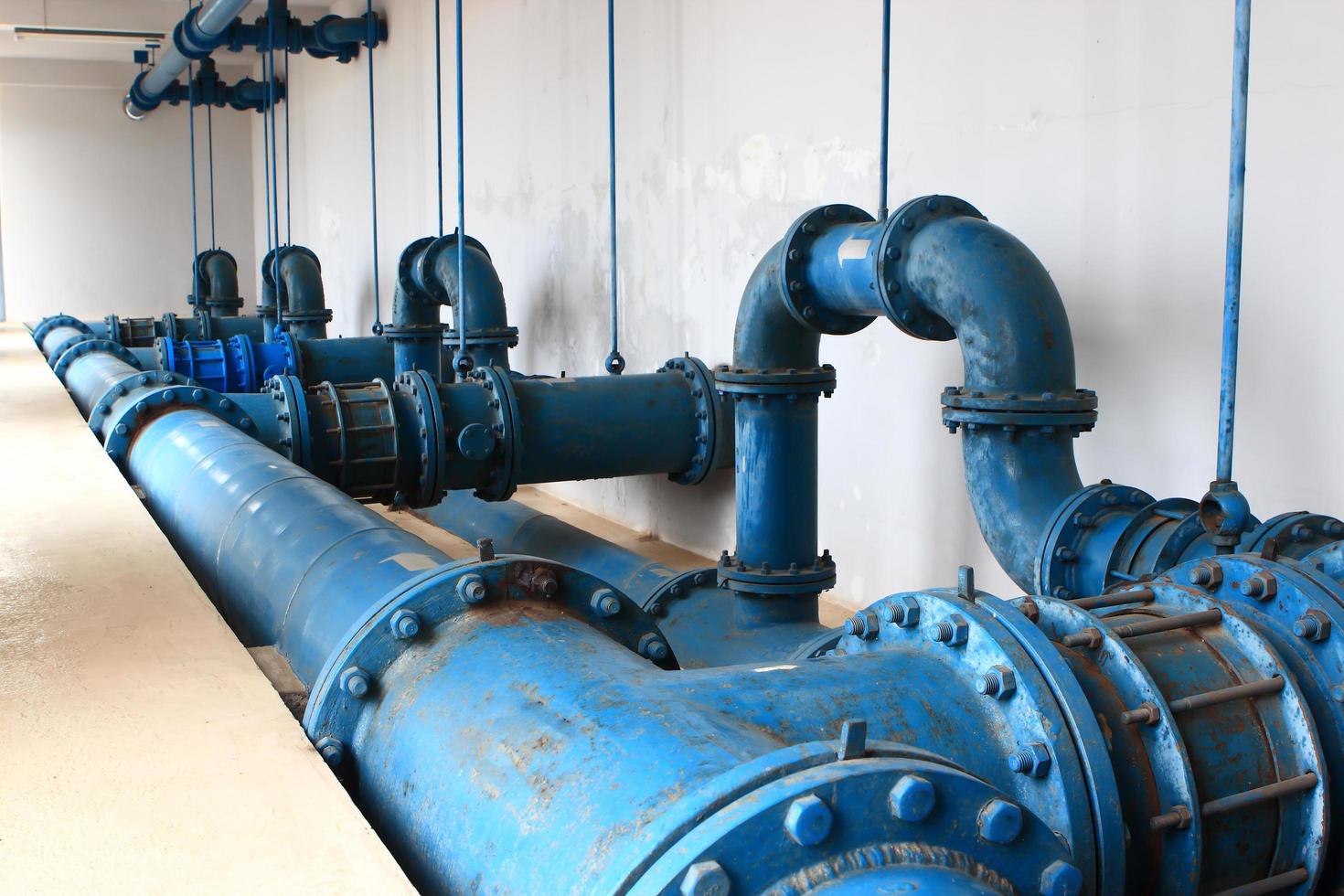 Water pumping station, industrial interior and pipes photo