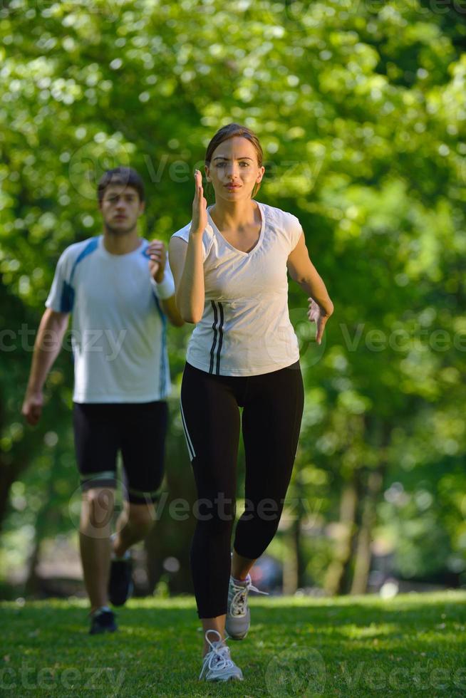Young couple jogging photo