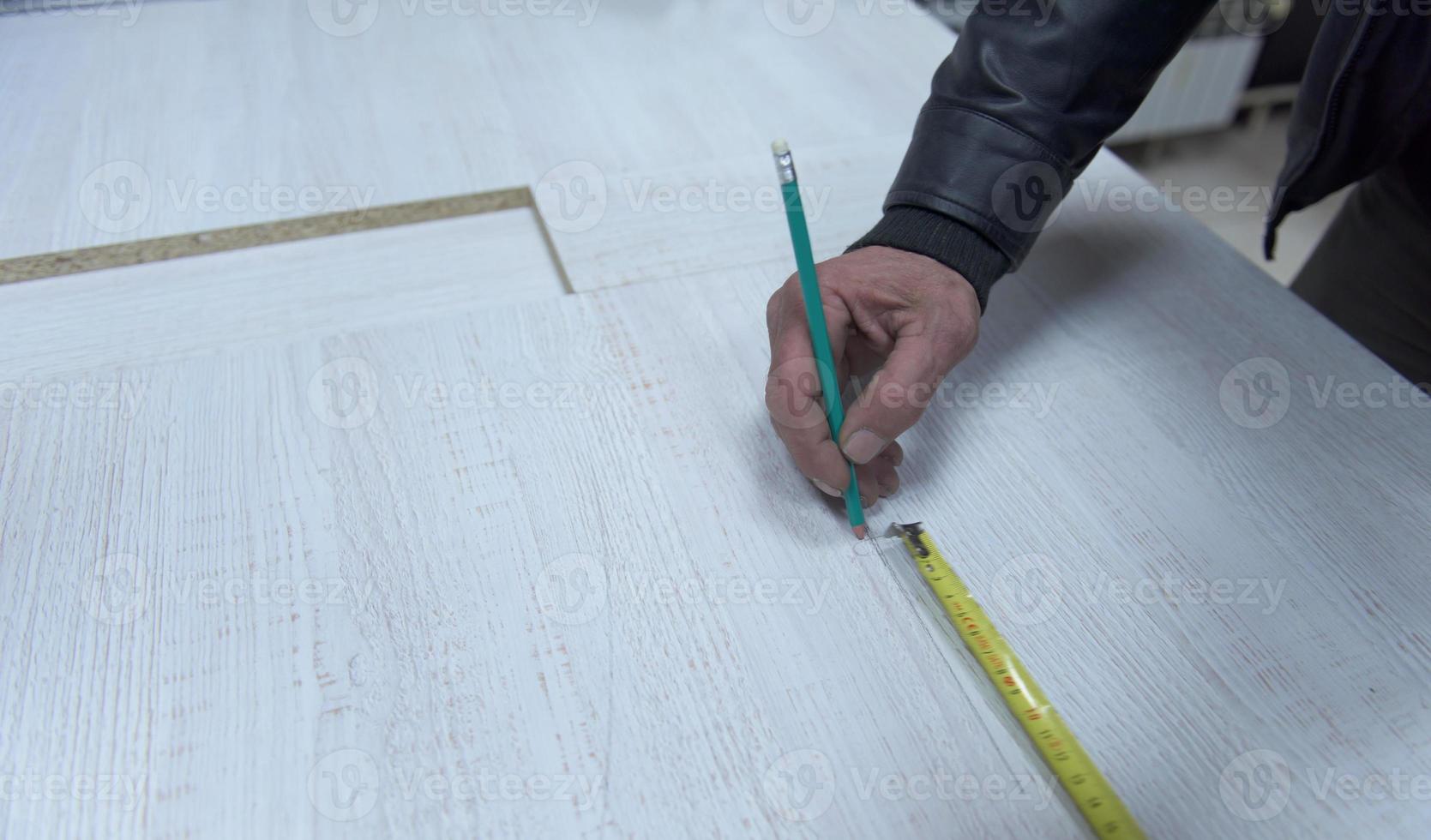 carpenter worker measuring photo