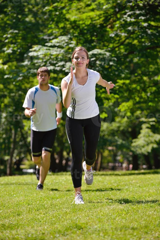 Young couple jogging photo