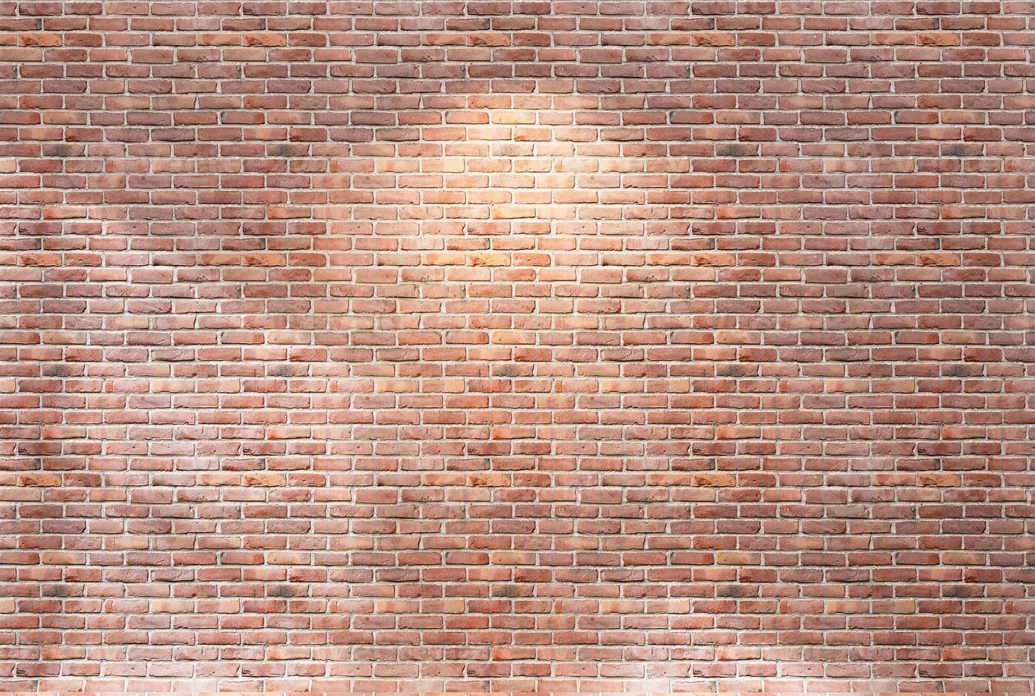 Empty room with red brick wall textured background photo