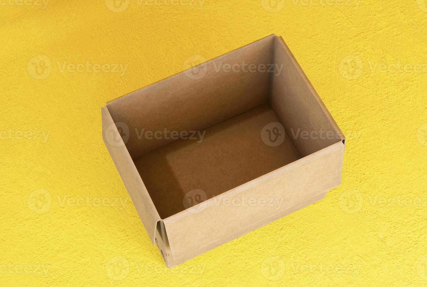 Empty open cardboard boxes on yellow background photo
