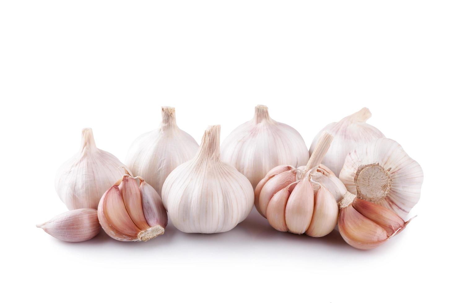 Fresh garlic isolated on white background photo