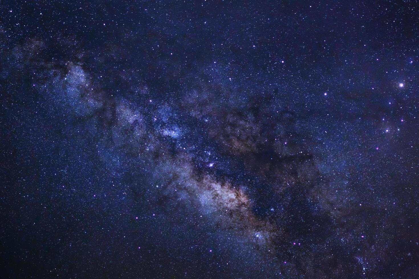 Close-up of Milky way galaxy with stars and space dust in the universe, Long exposure photograph, with grain. photo