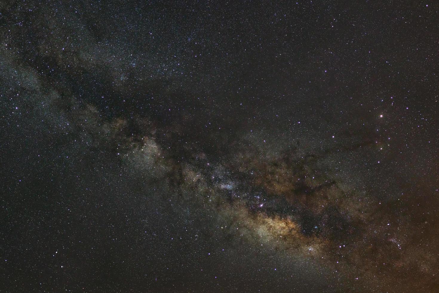 Close - up Milky way galaxy with stars and space dust in the universe, Long exposure photograph, with grain. photo