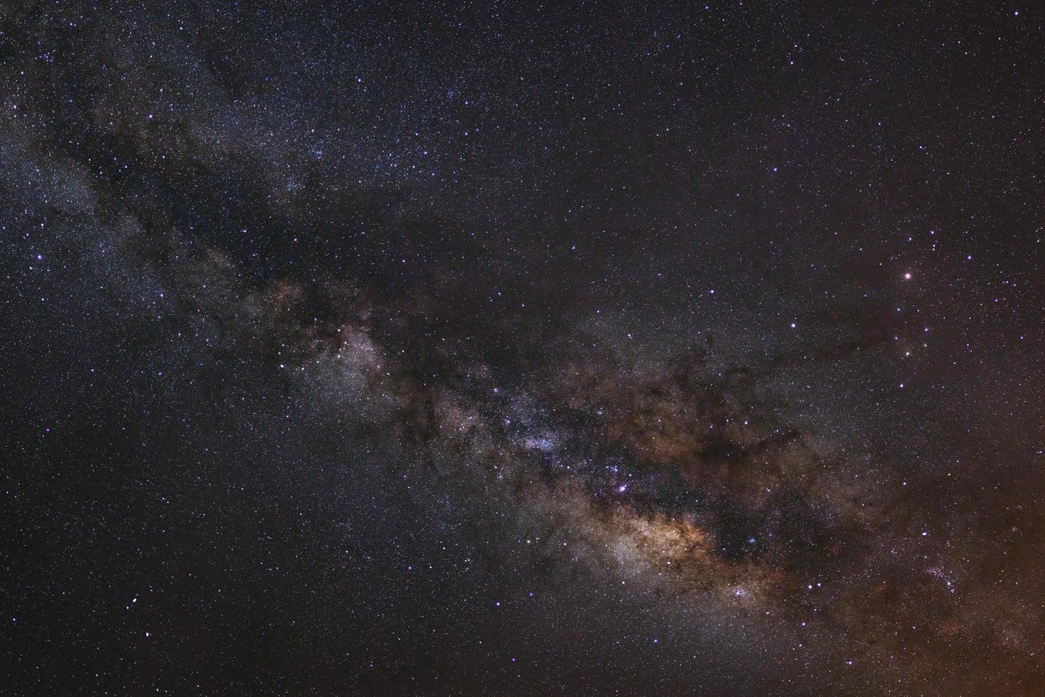 Close - up Milky way galaxy with stars and space dust in the universe, Long exposure photograph, with grain. photo