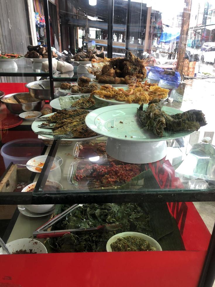 Padang food stall, typical Indonesian Minang food photo