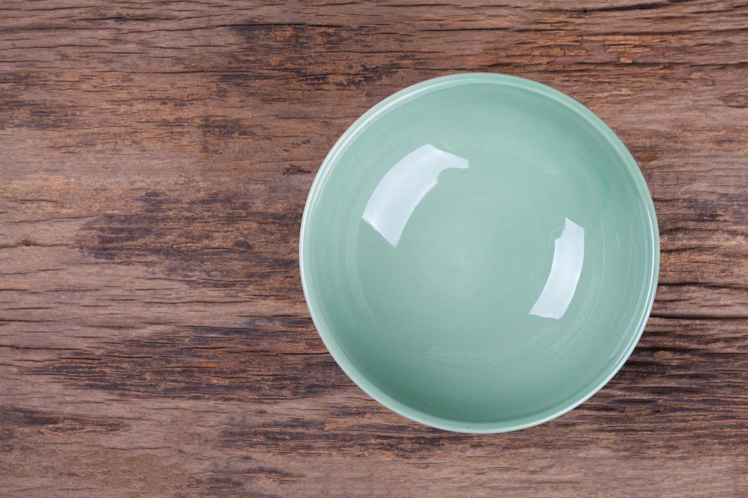 Empty bowl on wood photo