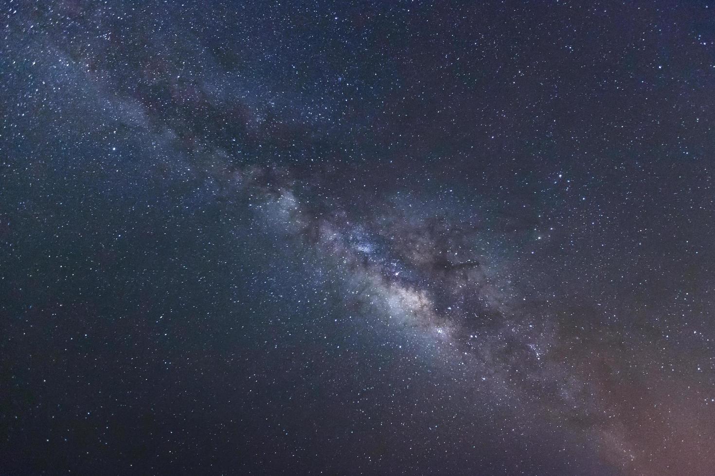 beautiful milkyway on a night sky, Long exposure photograph, with grain photo