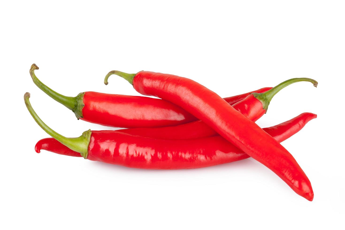 red chili or chilli cayenne pepper isolated on white background photo