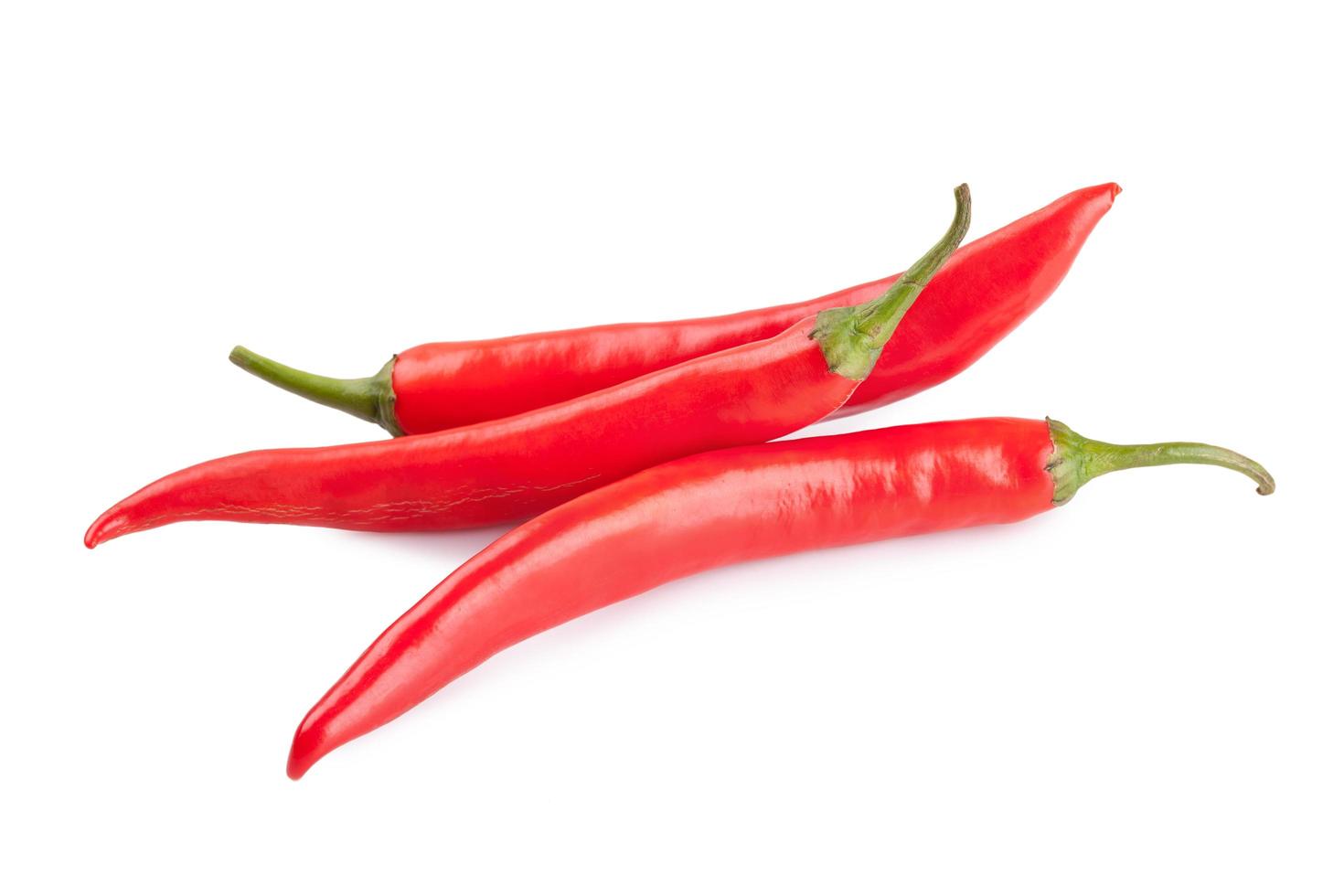 red chili or chilli cayenne pepper isolated on white background photo