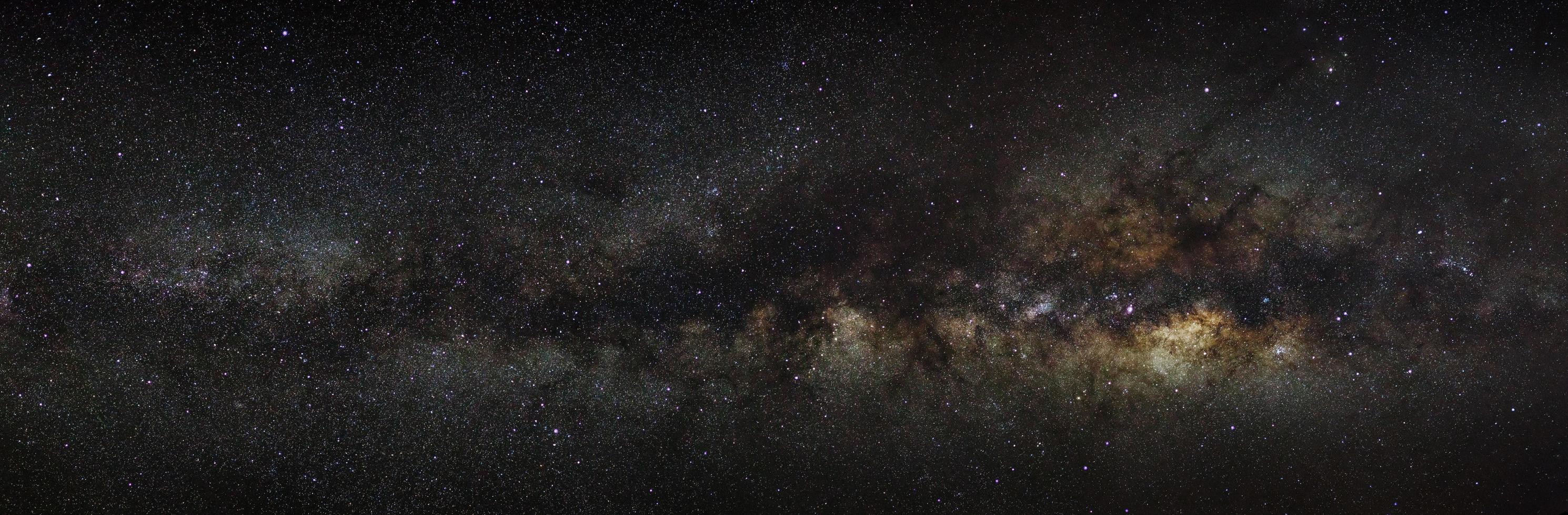 milky way galaxy on a night sky, long exposure photograph, with grain. photo