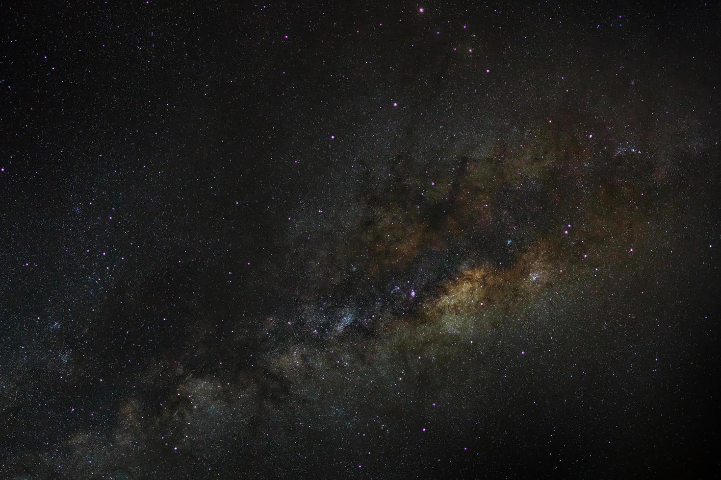 Milky way galaxy with stars and space dust in the universe, Long exposure photograph, with grain. photo