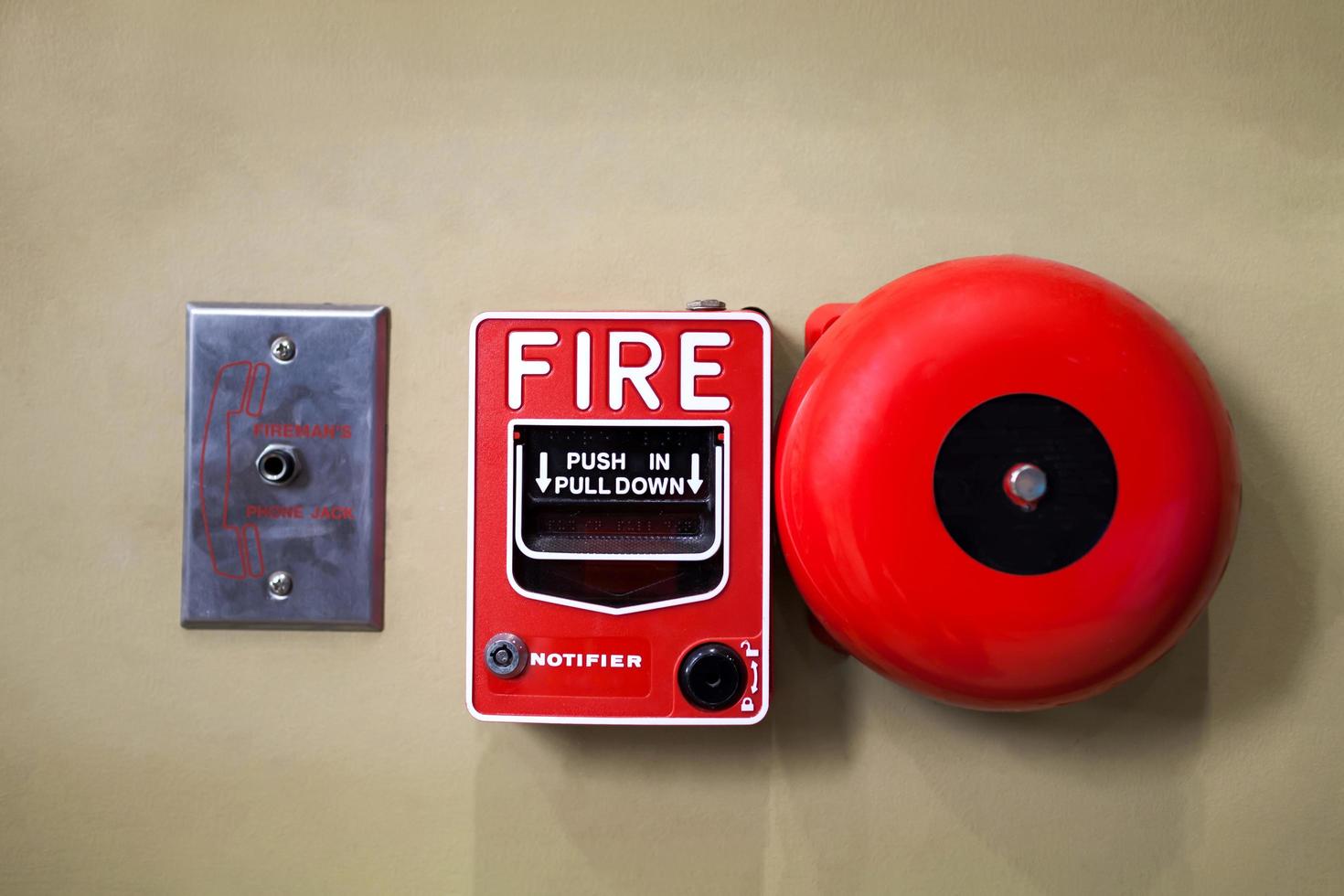 Fire alarm switch on old wall photo