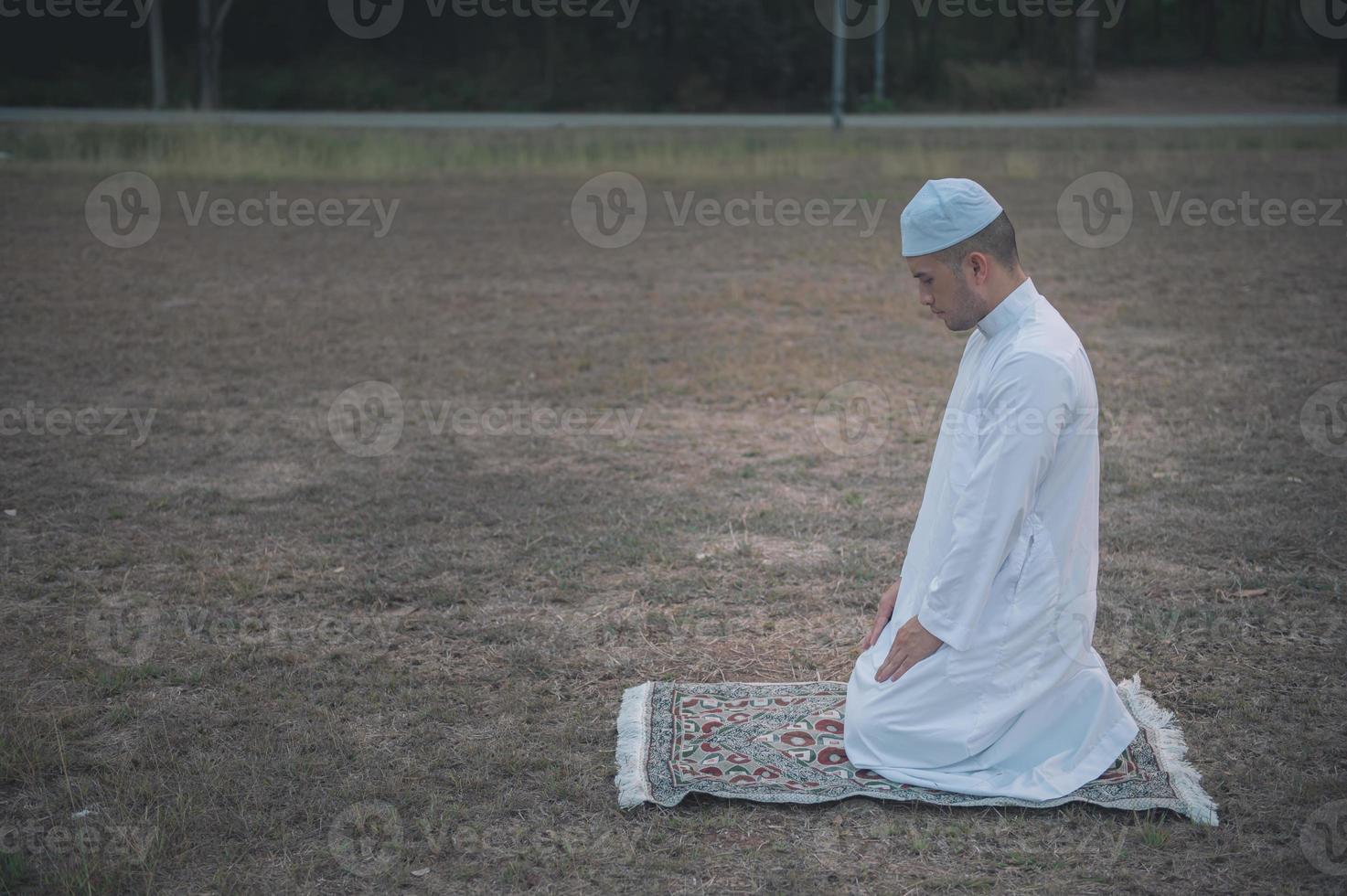Asian islam man prayer,Young Muslim praying,Ramadan festival concept photo