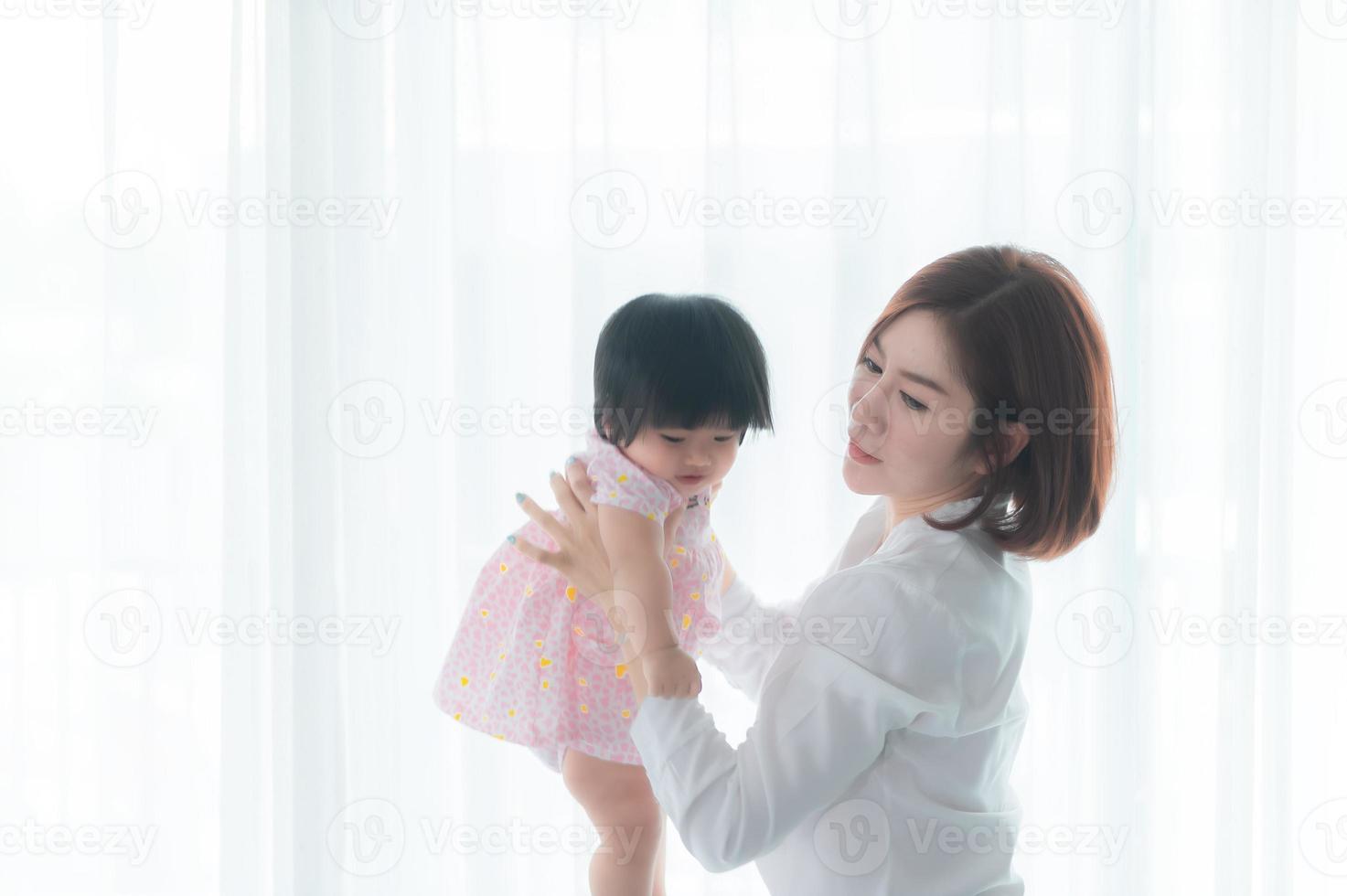 Mother and daughter newborn in home,Happy time of family,Single mom concept,Concept mother day photo