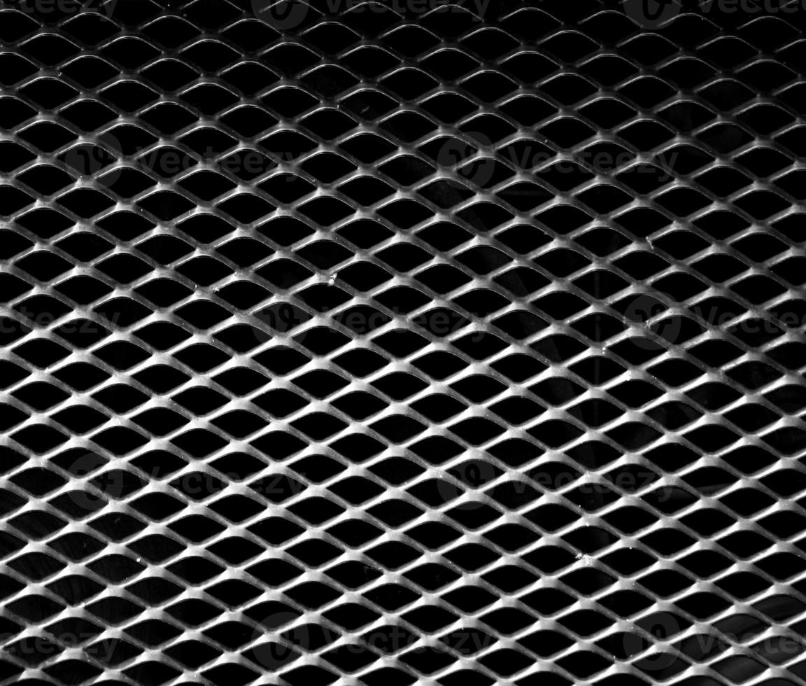 carbon fiber texture. Dark background photo