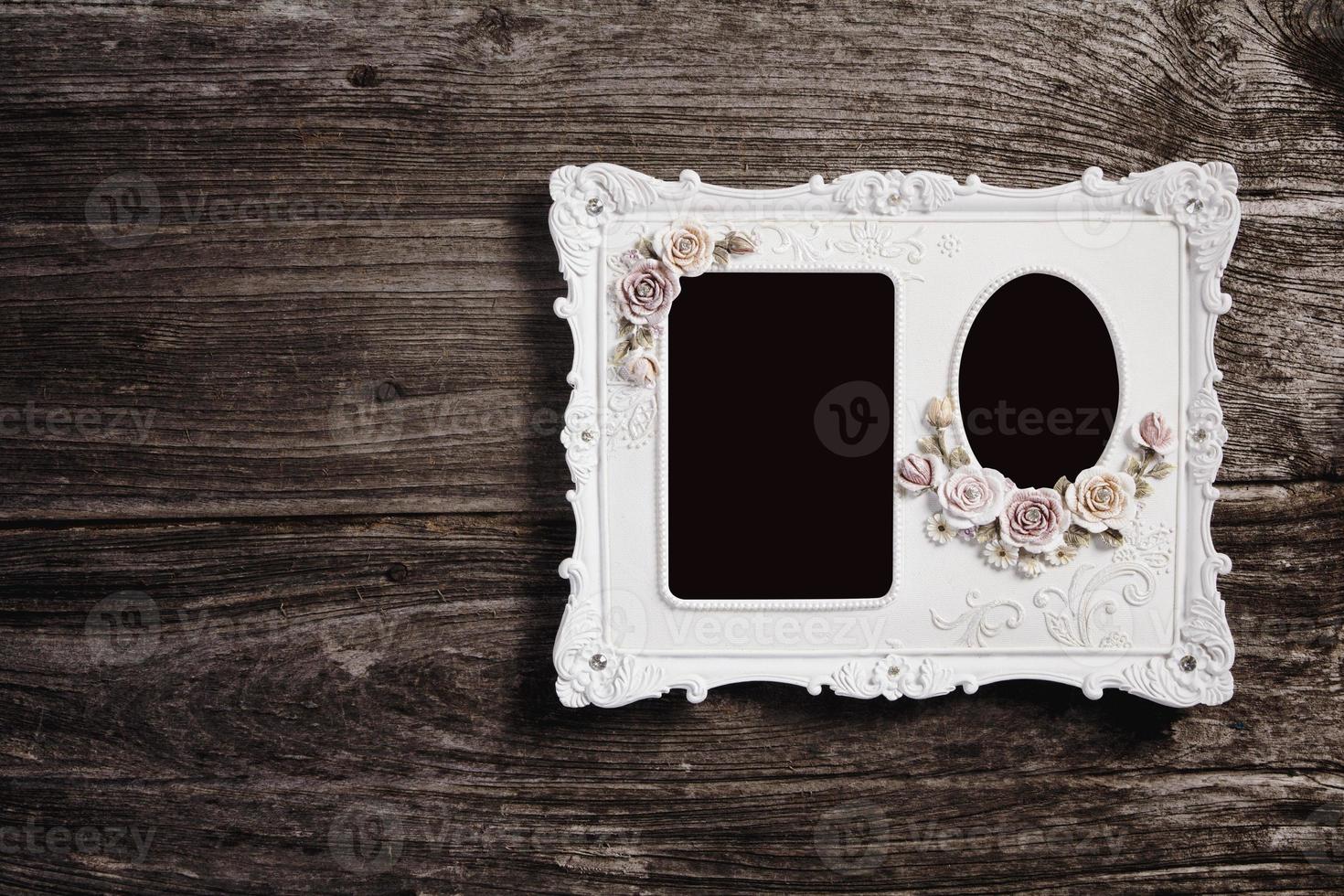 Vintage Photo frame on wood background