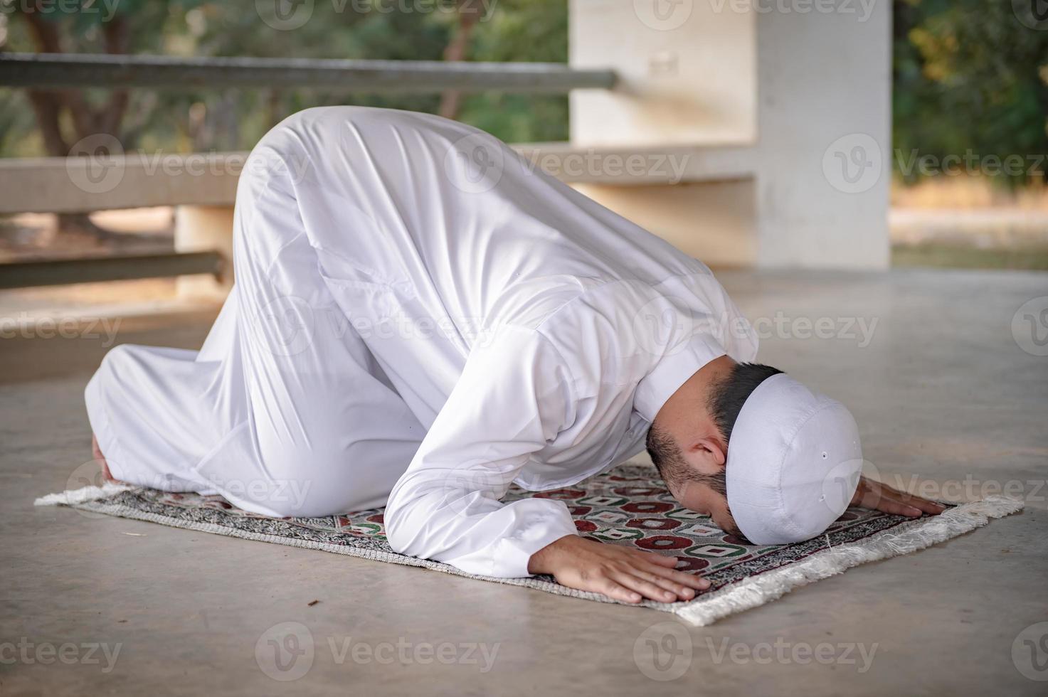 Asian islam man prayer,Young Muslim praying,Ramadan festival concept photo