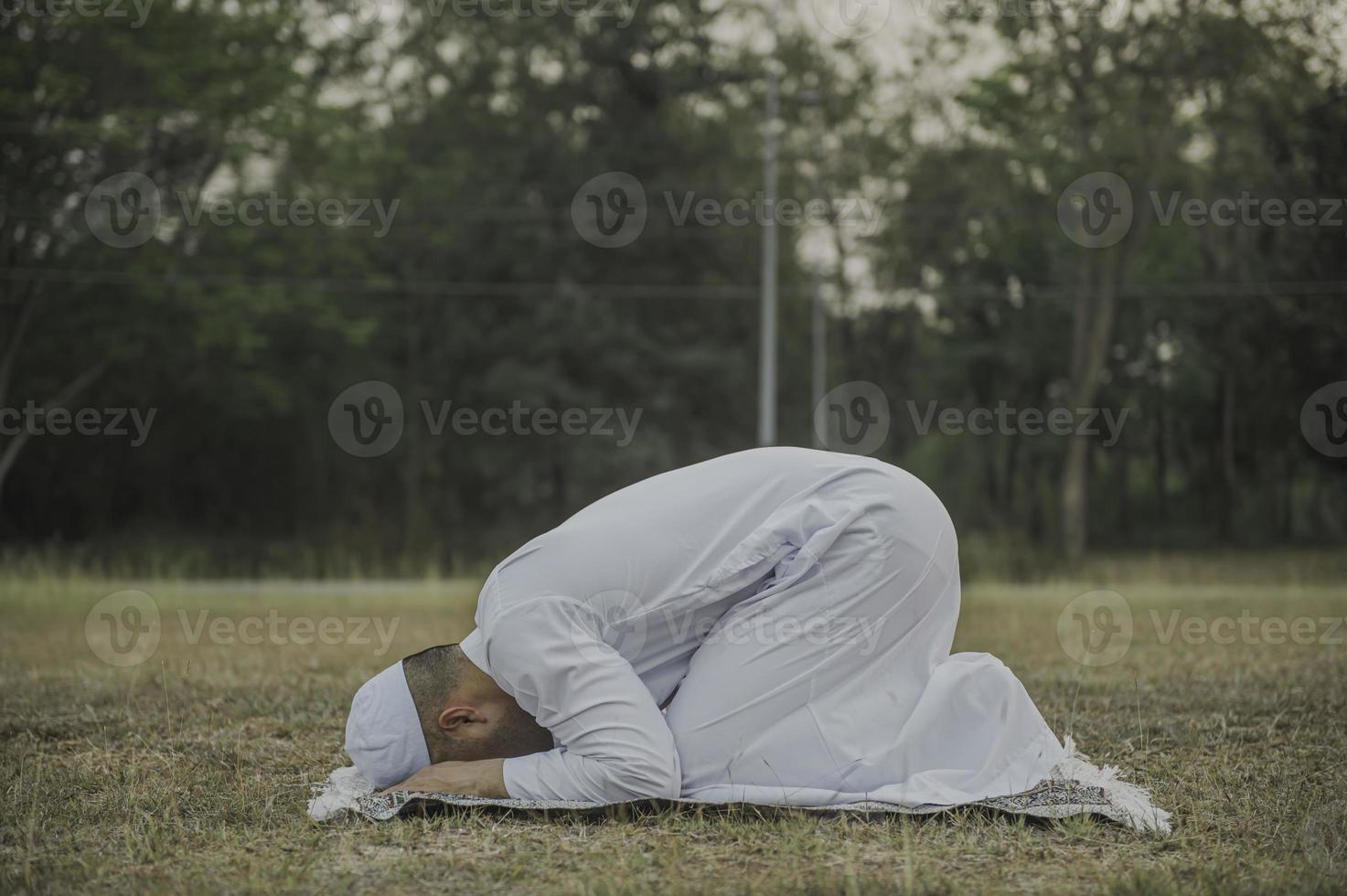 Asian islam man prayer,Young Muslim praying,Ramadan festival concept photo