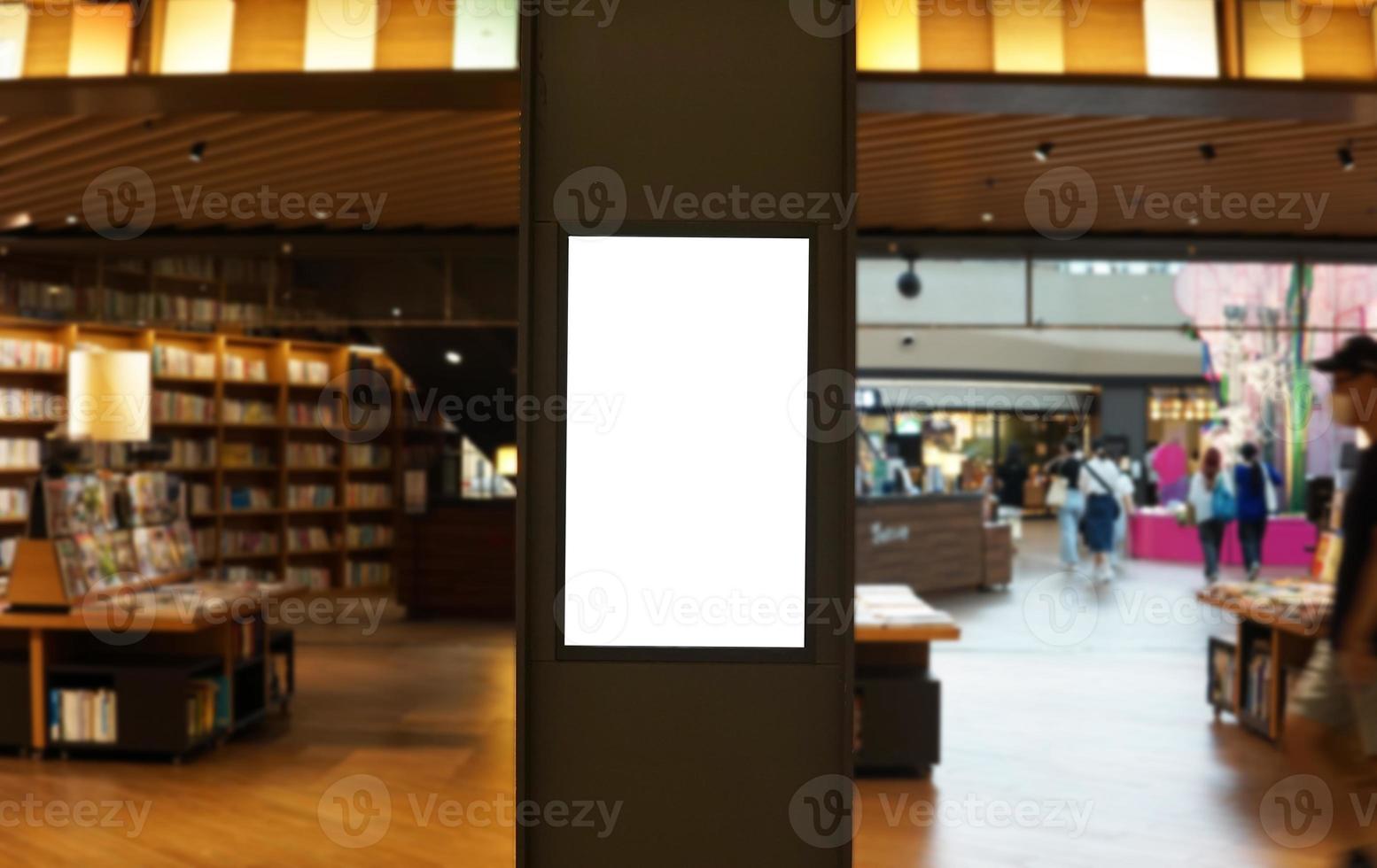 Advertising poster board inside department store photo