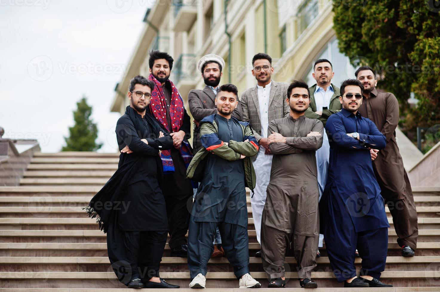Group of pakistani man wearing traditional clothes salwar kameez or kurta. photo