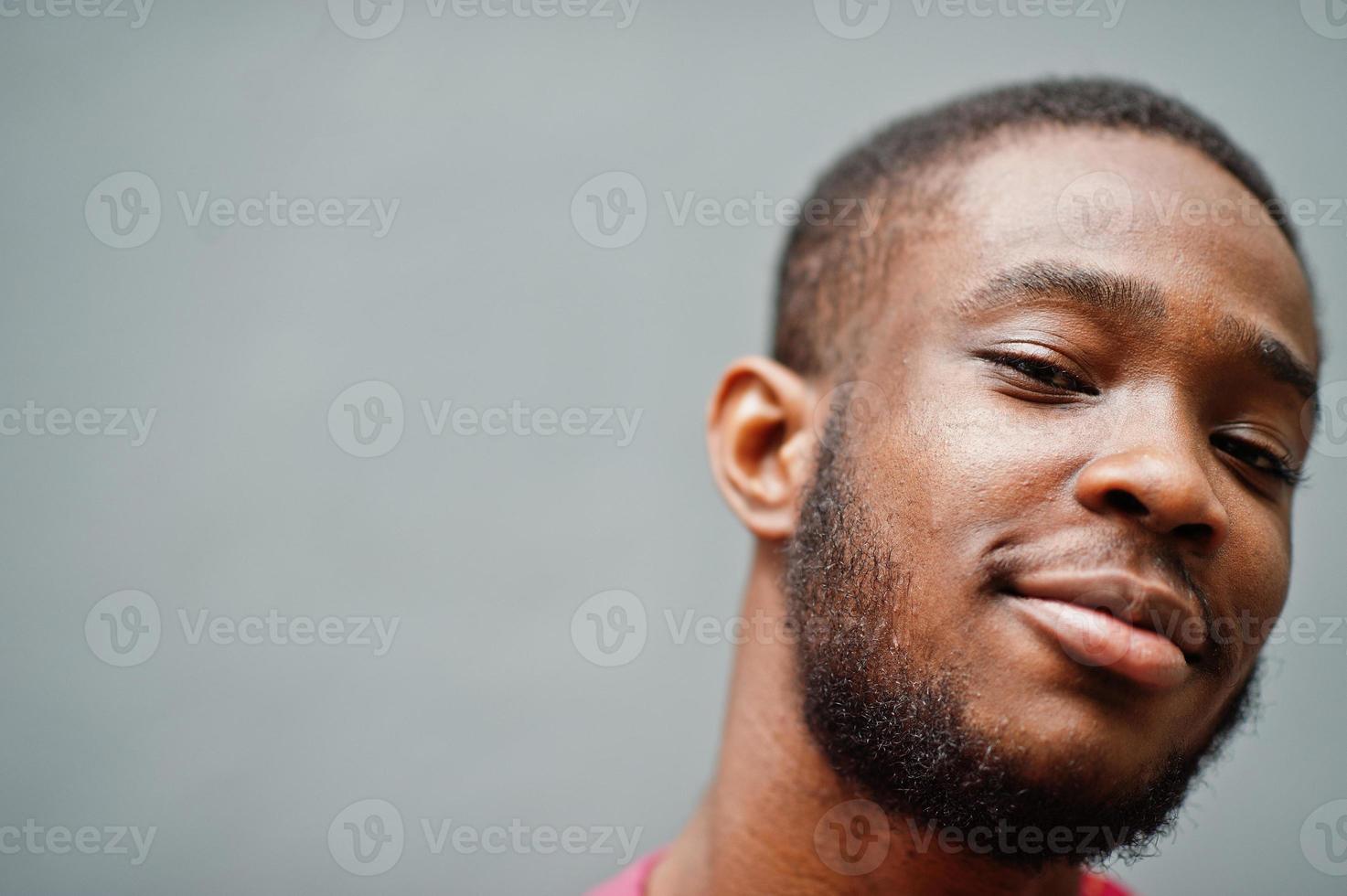 Very close up portrait of head black young man. photo