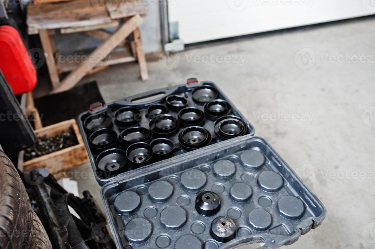 Car repair and maintenance theme. Filters of motor oill in auto service. photo