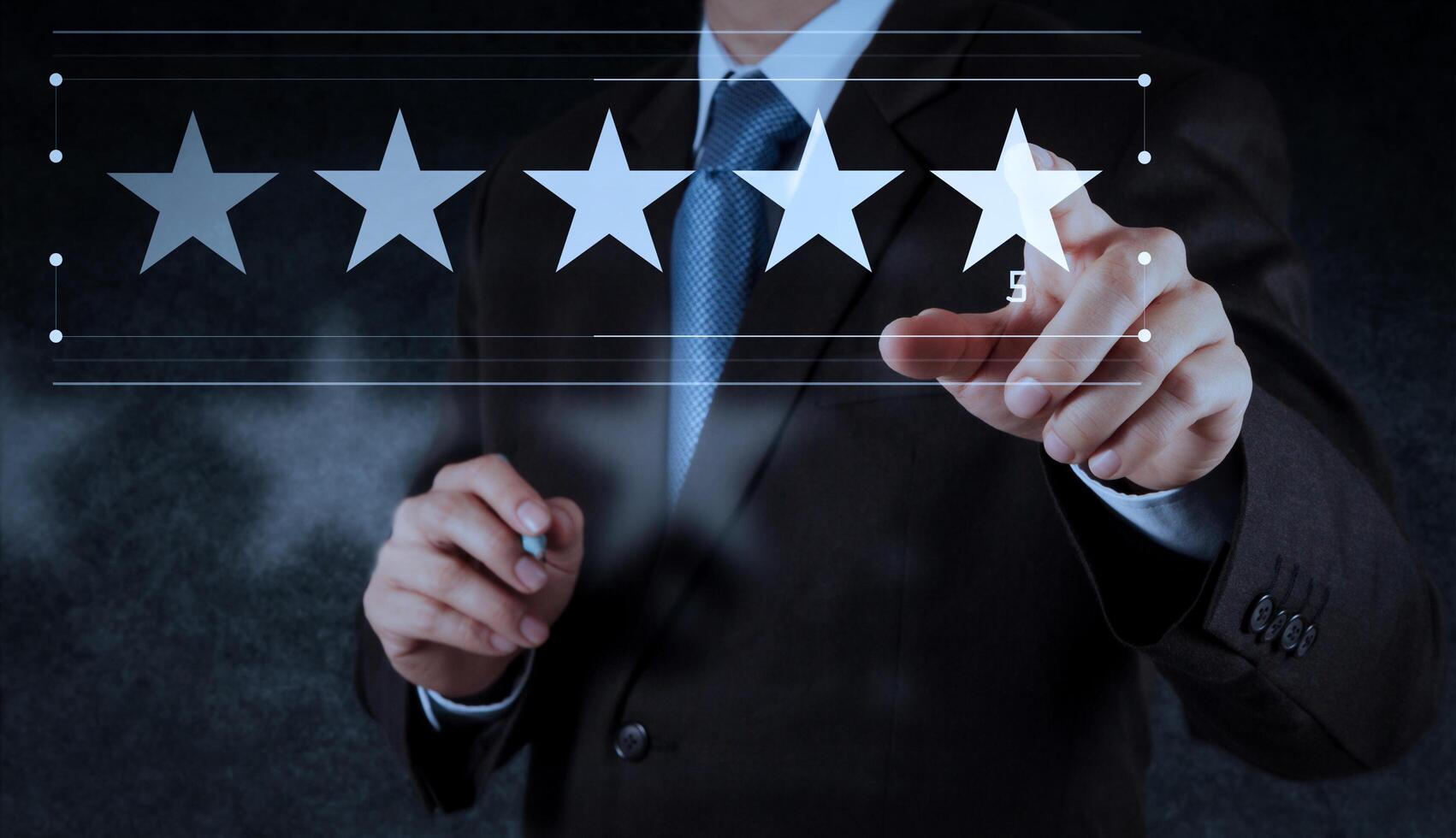 businessman hand touch five stars rate customer rate. photo