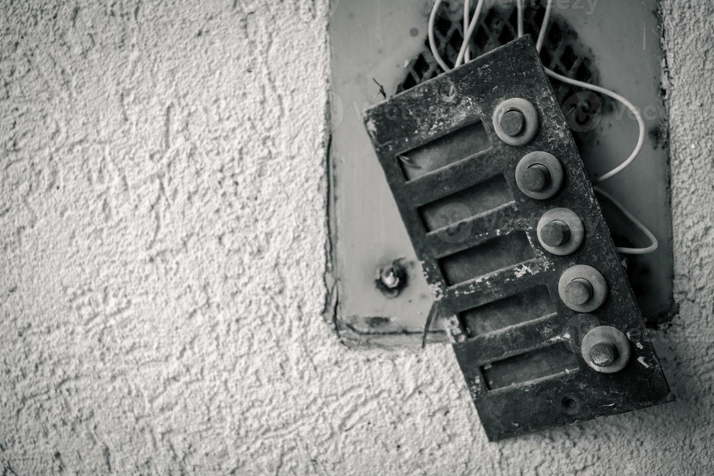 broken old door bells in selective focus photo
