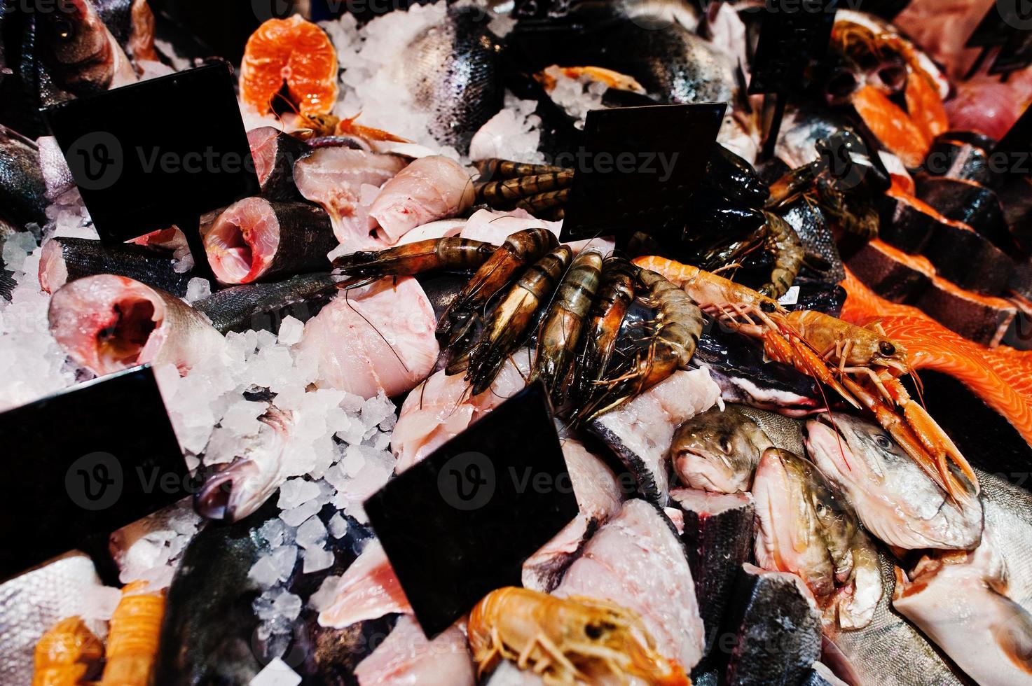 Frozen seafood for sale at supermarket. photo