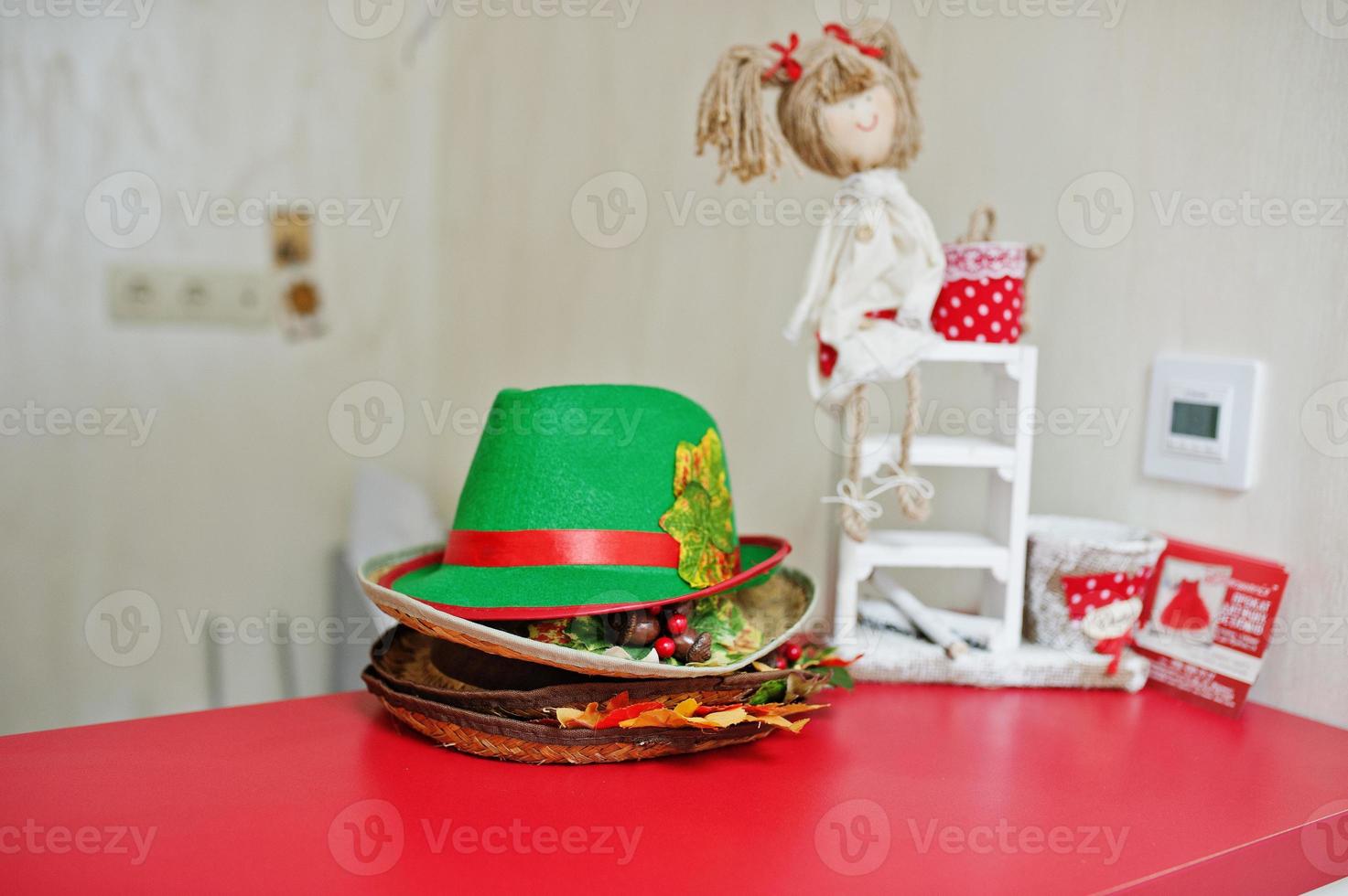 Children's carnival hats at seamstress office. photo