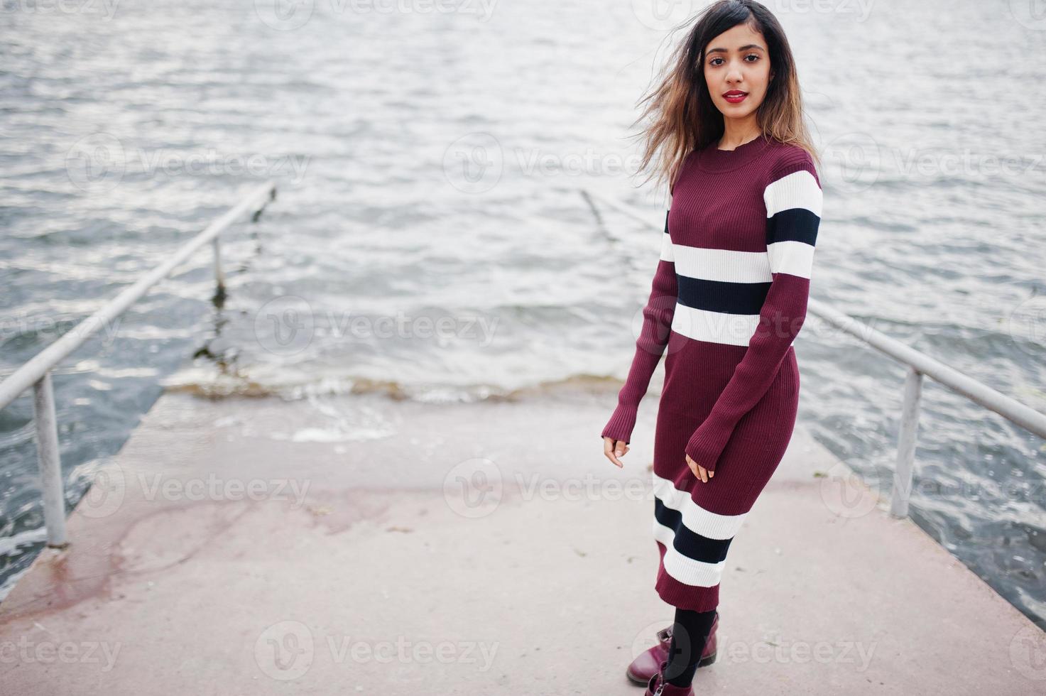 Portrait of young beautiful indian or south asian teenage girl in dress. photo