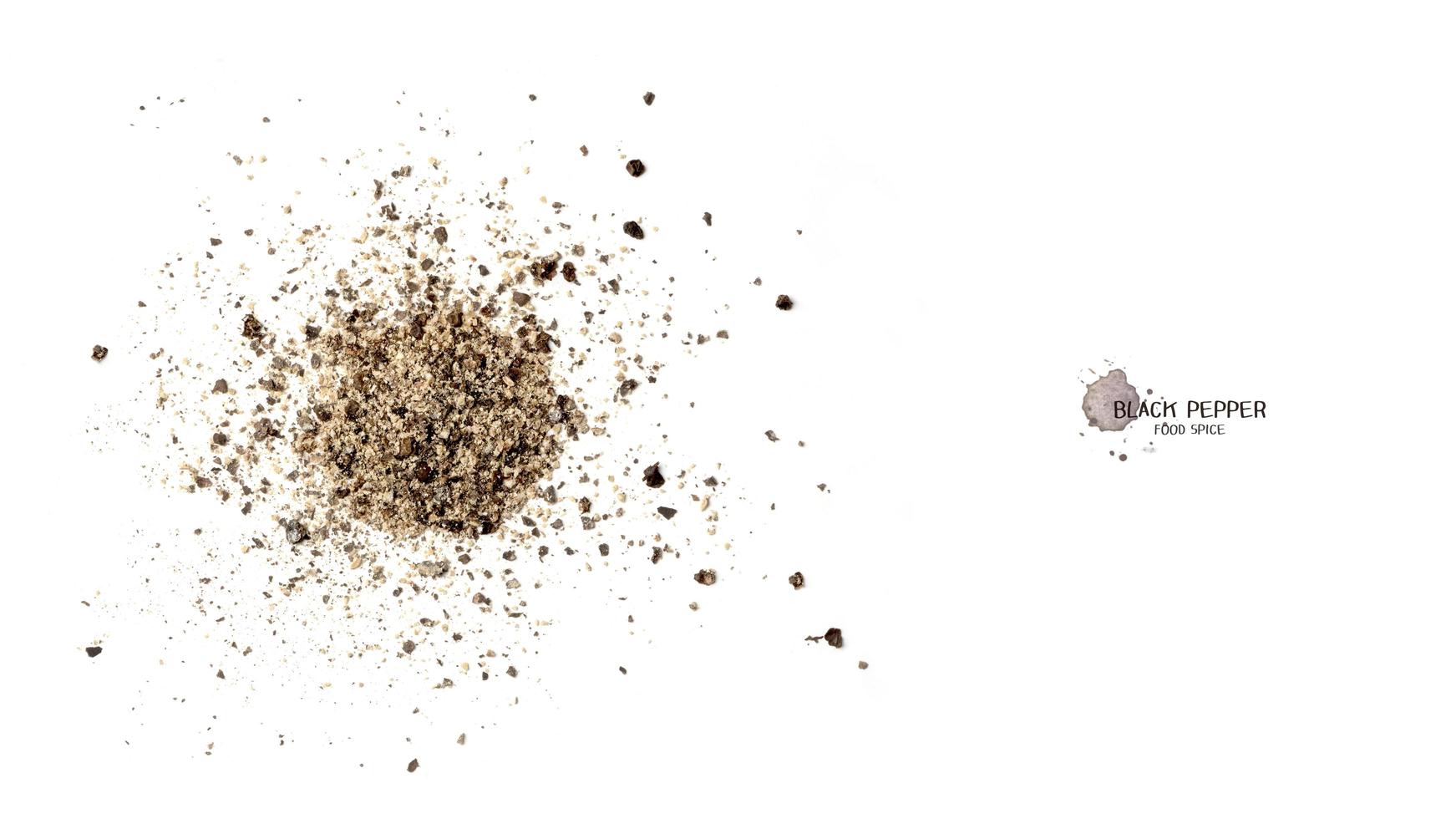 Black pepper seed powder on white background. Food ingredients, spices photo