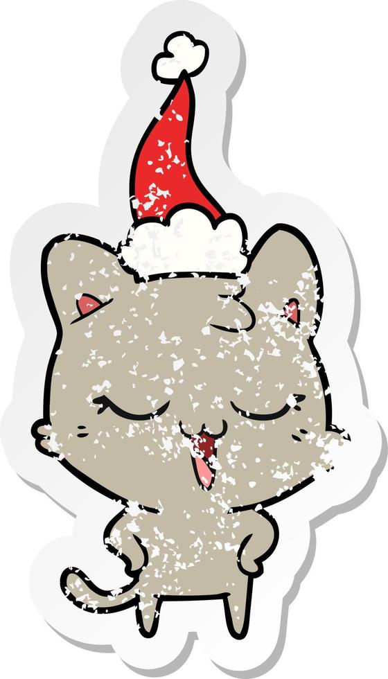 happy distressed sticker cartoon of a cat wearing santa hat vector