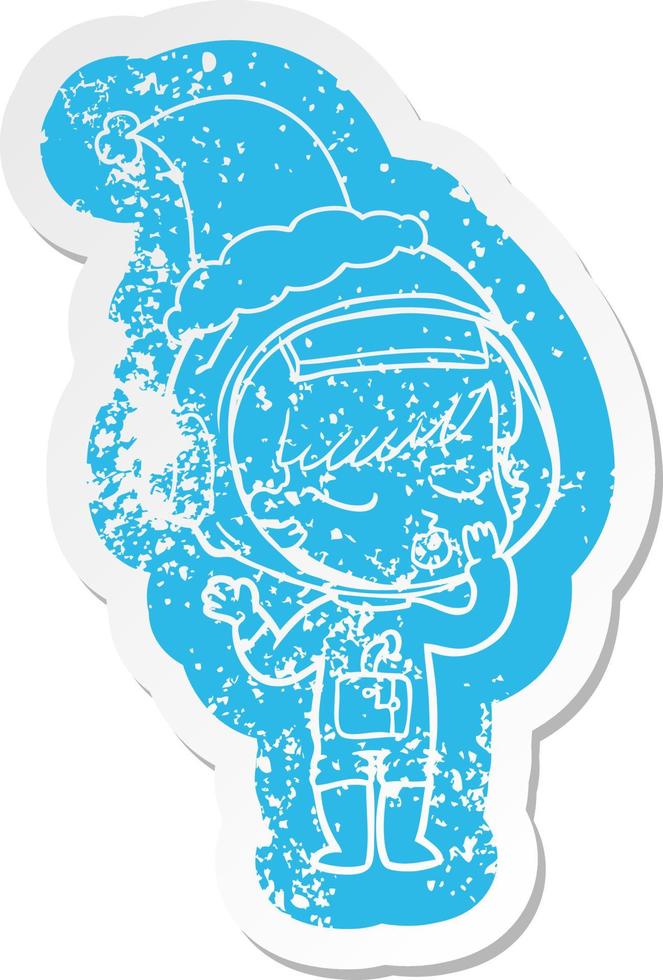 cartoon distressed sticker of a pretty astronaut girl wearing santa hat vector