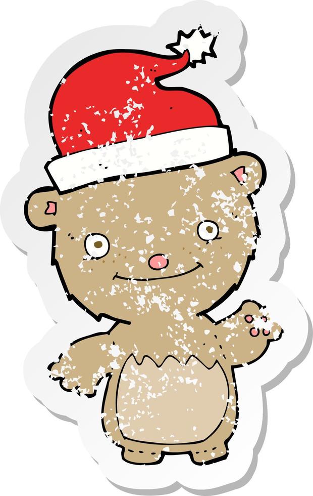 retro distressed sticker of a cartoon christmas teddy bear vector